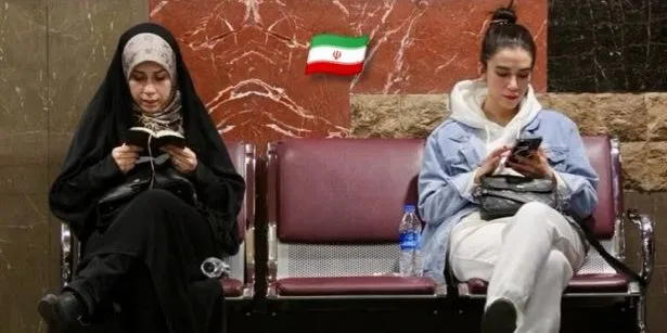 Two Iranian women, one with and one without a hijab (Tehran, 2023)

